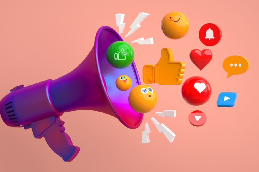 A purple megaphone with emojis coming out of it